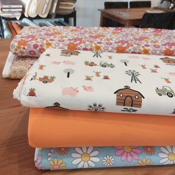 Tricot uni gecombineerd met print