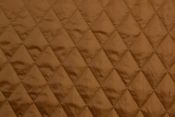 Gewatteerde voering donker camel